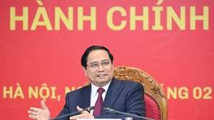 Prime Minister Pham Minh Chinh addresses the working session with the Academy of Public Administration and Governance (APAG) in Ha Noi on February 28. (Photo: NDO)