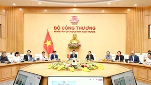 At the simultaneous online talks between Minister of Industry and Trade Nguyen Hong Dien and US Secretary of Commerce Howard Lutnick and Trade Representative Jamieson Greer on June 19 (Photo: VNA)