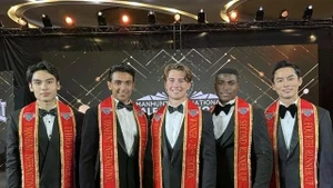 The top five at the Manhunt International 2025 competition. A French contestant (centre) won the pageant, while Vietnamese representative Nguyen Vu Linh (right) was the fourth runner-up. (Photo: Courtesy of Manhunt International 2025)