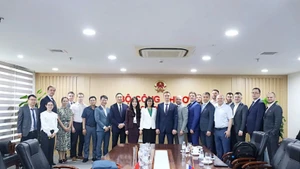 Participants at the meeting (Photo: moit.gov.vn)