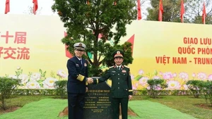 Vietnamese Minister of National Defence General Phan Van Giang (R) and Chinese Minister of National Defence Senior Lieutenant General Dong Jun attend the 10th Viet Nam–China Border Defence Friendship Exchange in Quang Ninh province. (Photo: qdnd.vn)