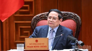 Prime Minister Pham Minh Chinh speaks at the meeting of the Government’s standing members in Ha Noi on March 21. (Photo: VNA)