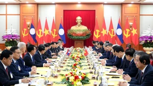 At the talks between General Secretary of the Communist Party of Vietnam Central Committee To Lam and General Secretary of the Lao People’s Revolutionary Party Central Committee and President of Laos Thongloun Sisoulith. (Photo: NDO)