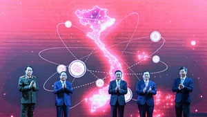 Delegates launch mobile application on information and education, and mass mobilisation affairs (TGDV) (Photo: NDO)