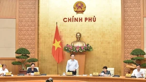 Deputy Prime Minister Mai Van Chinh chairs a meeting of the steering committee for the exhibition on national achievements marking the 80th National Day. (Photo: VGP)