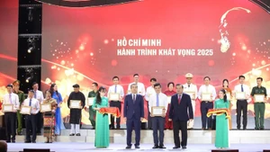 Outstanding models in studying and following President Ho Chi Minh’s example honoured at the programme.