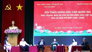 Participants join a panel discussion at the event (Photo: qdnd.vn)