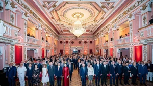 Officials and guests at the flag saluting ceremony (Photo: VNA)