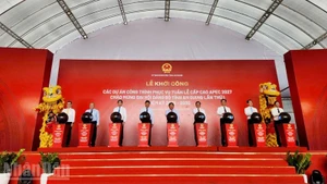 Delegates attend the groundbreaking ceremony for the 10 projects.