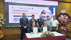 At the signing ceremony