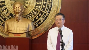 Vietnamese Ambassador to China Pham Thanh Binh speaks at the ceremony.