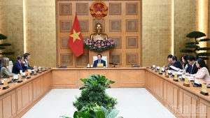 Prime Minister Pham Minh Chinh speaks at the meeting with a delegation of the EU-ASEAN Business Council (EU-ABC) and the European Chamber of Commerce in Viet Nam (EuroCham) on November 27. (Photo: NDO)