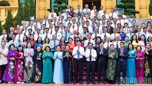 State President Luong Cuong and delegates at the event
