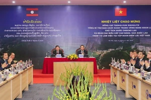 Lao General Secretary and President Thongloun Sisoulith's working session with EVN.