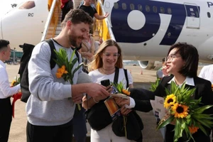 A ceremony was held at Phu Quoc International Airport to welcome Viet Nam’s 20-millionth international visitor. (Photo: Cong Dat)