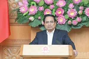 Prime Minister Pham Minh Chinh speaks at the 22nd meeting of the State steering committee for national key projects in the transport sector. (Photo: Tran Hai)