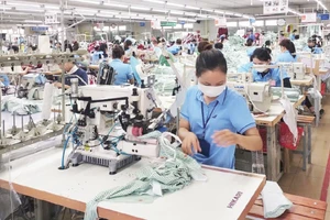 Garment production for export at Hoa Tho Garment Factory, Quang Ngai. (Photo: Hoang Anh)