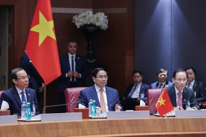 Prime Minister Pham Minh Chinh during the talks with his Algerian counterpart Sifi Ghrieb. (Photo: VGP)