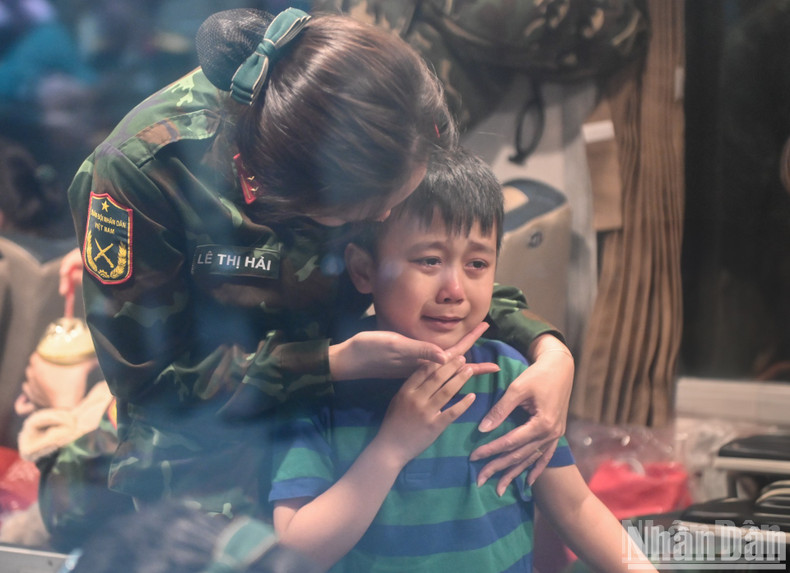 A boy could not hold back his tears as he said goodbye to his mother.