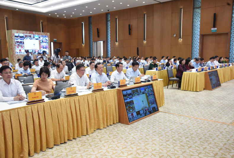 Delegates attend the meeting.