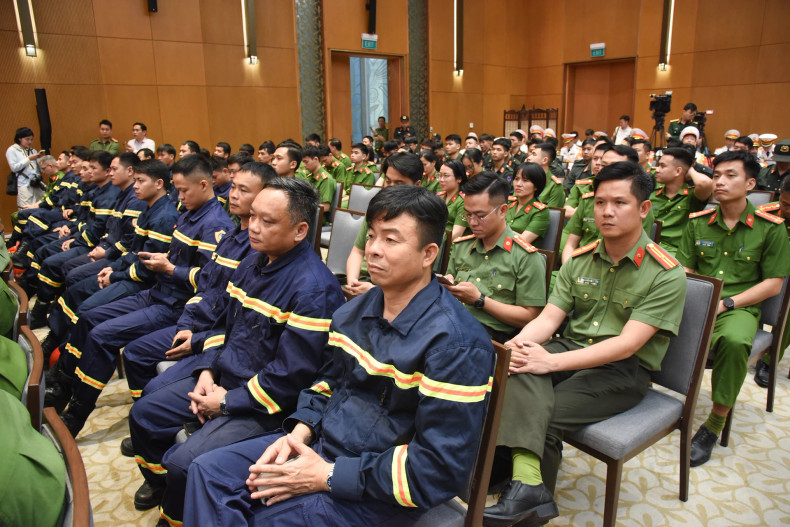 Delegates attend the ceremony.