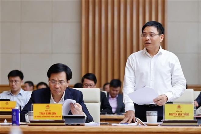 Minister of Finance Nguyen Van Thang speaks at the meeting. (Photo: VNA)