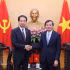 Politburo member and Director of the Ho Chi Minh National Academy of Politics (HCMA) Doan Minh Huan (R) receives Chinese Ambassador to Vietnam He Wei in Hanoi on June 1 (Photo: VNA)