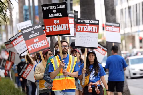 Writers Guild of America members and supporters picket outside Sunset Bronson Studios and Netflix Studios, after union negotiators called a strike for film and television writers, in Los Angeles, California, U.S., May 3, 2023. (Photo: REUTERS) Writers Guild of America members and supporters picket outside Sunset Bronson Studios and Netflix Studios, after union negotiators called a strike for film and television writers, in Los Angeles, California, U.S., May 3, 2023. (Photo: REUTERS)