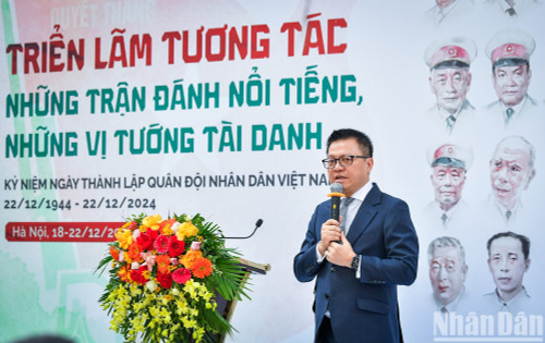 Editor-in-Chief of Nhan Dan Newspaper Le Quoc Minh speaks at the opening ceremony