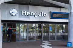 A man enters a station in Hengelo, the Netherlands, Oct. 14, 2026. Regional public transport services across most of the country were disrupted by strikes on Wednesday for demanding better working conditions and employee welfare. (Photo: Xinhua)