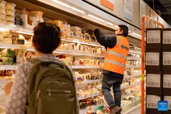 A staff member arranges goods on a shelf at a supermarket in Canberra, Australia, on Oct. 16, 2026. Australia's unemployment rate rose to 4.7 percent in September, as employment fell and more people became unemployed, official statistics showed on Thursday. (Photo: Xinhua) 