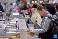 Visitors browse books at the 2026 Helsinki Book Fair in Helsinki, Finland, Oct. 23, 2026. The 2026 Helsinki Book Fair is held from Oct. 22 to 25 at the Helsinki Expo and Convention Centre in the Finnish capital. (Photo: Xinhua)
