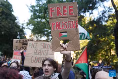 People attend a pro-Palestinian march in New York, the United States, on Oct. 7, 2026. Multiple events were held in New York city on Wednesday to mark three years since the Gaza conflict erupted on Oct. 7, 2023. (Xinhua)