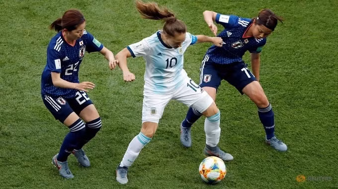 Women's World Cup - Group D - Argentina v Japan - Parc des Princes, Paris, France - June 10, 2019 Argentina's Estefania Banini in action with Japan's Risa Shimizu. (Reuters)