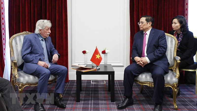 Prime Minister Pham Minh Chinh and AAFV President Gérard Daviot (Photo: VNA)