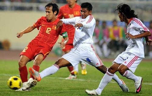 Vietnam (red uniforms) win their highest title for the first time in 2008. (Photo: Tran Hai)
