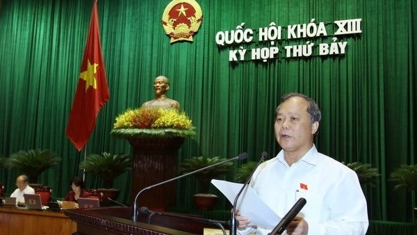 Chairman of the NA’s Committee for Legal Affairs Phan Trung Ly speaks at the session on June 20