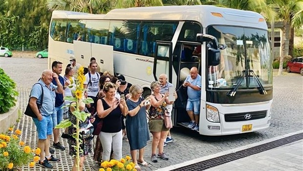 A group of French tourists visiting Binh Thuan. (Photo: VNA)