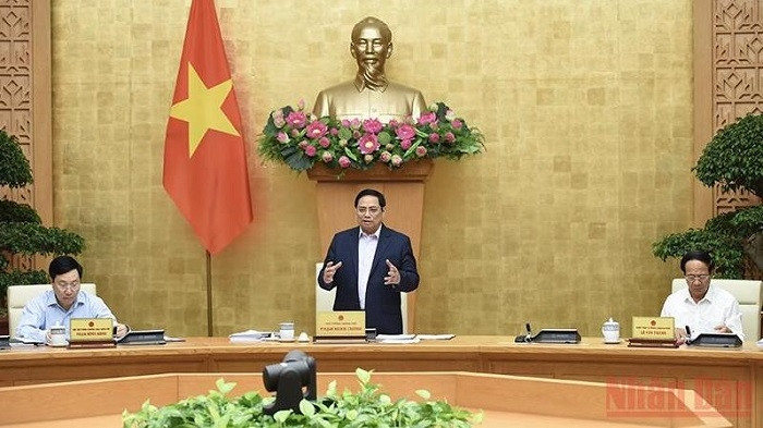 Prime Minister Pham Minh Chinh speaks at the meeting. (Photo: NDO/Tran Hai)