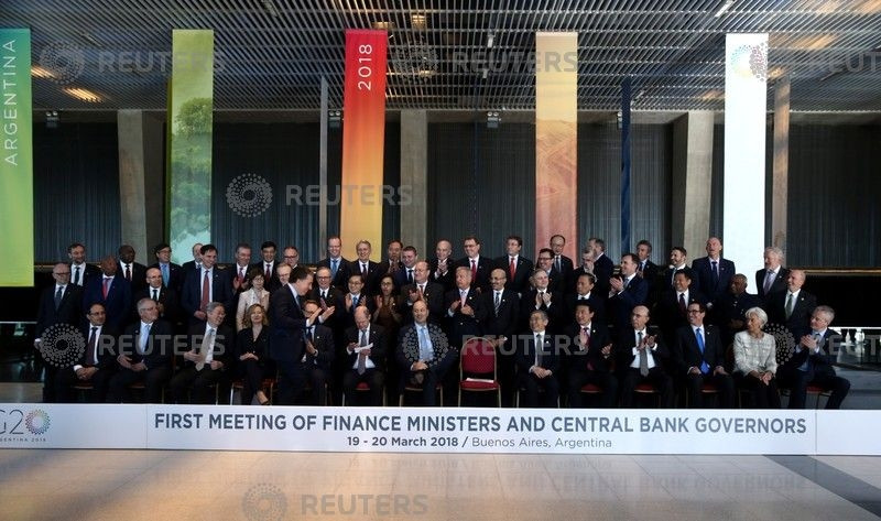 Argentina's Secretary of Treasury Nicolas Dujovne is applauded as he arrives for the official photo at the G20 Meeting of Finance Ministers in Buenos Aires, Argentina, March 19, 2018. (Photo:Reuters)