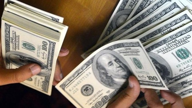 Remittance to Vietnam forecast to continue growing despite the pandemic in 2021. (Photo: AFP/VNA)