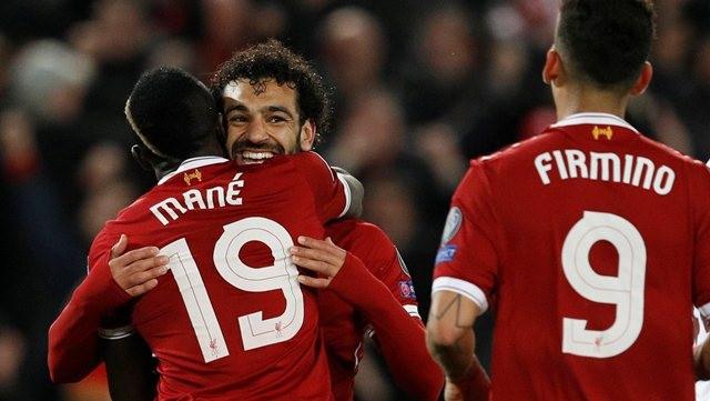 Liverpool's Sadio Mane celebrates scoring their third goal with Mohamed Salah and Roberto Firmino. (Photo: Reuters)