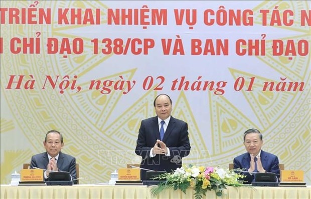 PM Nguyen Xuan Phuc speaking at the conference.