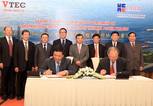 At the contract-signing ceremony 