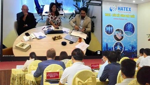 Businesses from the Netherlands exchange information with Vietnamese counterparts at an online event held on September 16. (Photo: VNA)
