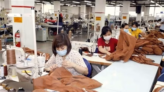 Garment and textile is one of Vietnam's main staples exported to Laos. (Photo: VNA)