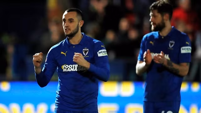 AFC Wimbledon's Dylan Connolly and Anthony Wordsworth celebrate after the match - FA Cup Fourth Round - AFC Wimbledon v West Ham United - The Cherry Red Records Stadium, London, Britain - January 26, 2019. (Photo: Action Images via Reuters)