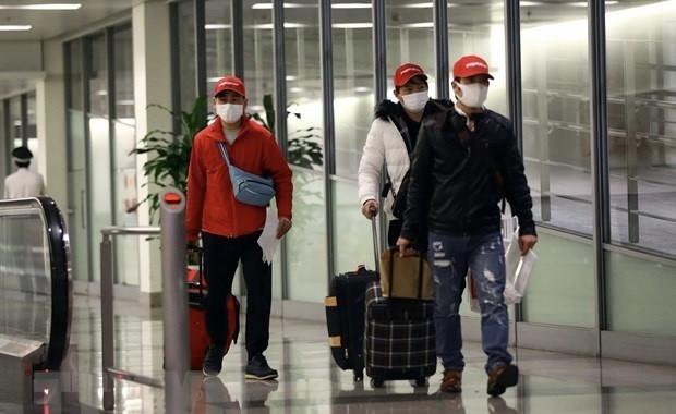 Japanese visitors at Noi Bai International Airport in Hanoi. (Photo: VNA)
