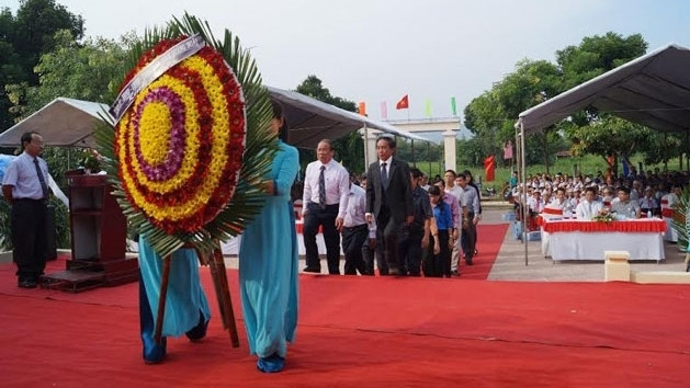 A wreath of flowers was laid to commemorate the victims of the two massacres which took place 50 years ago.