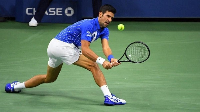 Sep 4, 2020; Flushing Meadows, New York, USA; Novak Djokovic hits the ball against Jan-Lennard Struff on day five of the 2020 US Open tennis tournament at USTA Billie Jean King National Tennis Centre. (Photo: USA TODAY Sports)